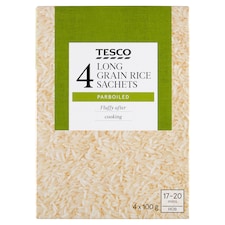 Tesco Predvarená dlhozrnná ryža, lúpaná, vo varných vreckách 4 x 100 g (400 g)
